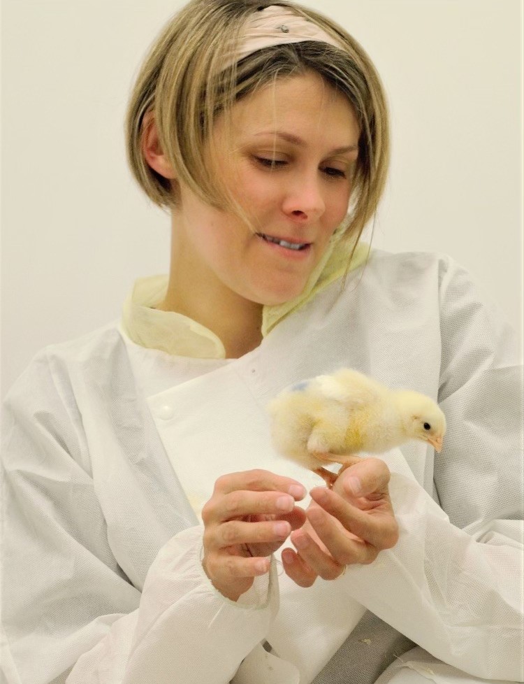 Lucy Asher holding a chick
